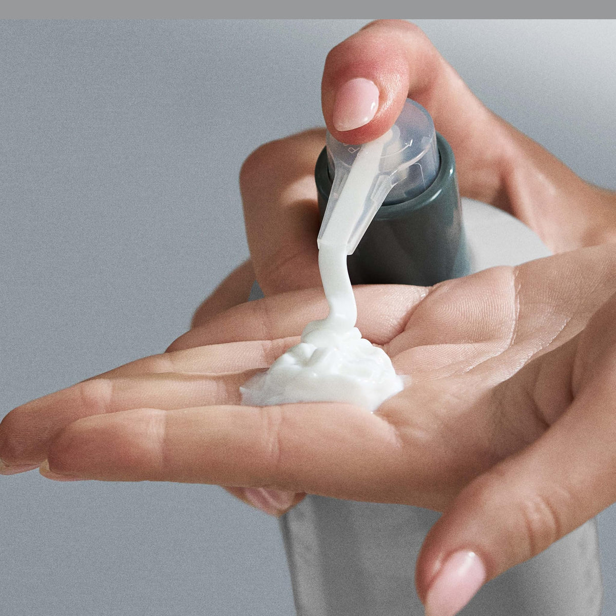Dermalogica lotion being applied to arm for instant hydration