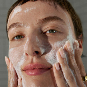 Open Dermalogica tube with powder spilling slightly indicating fresh activation and potency