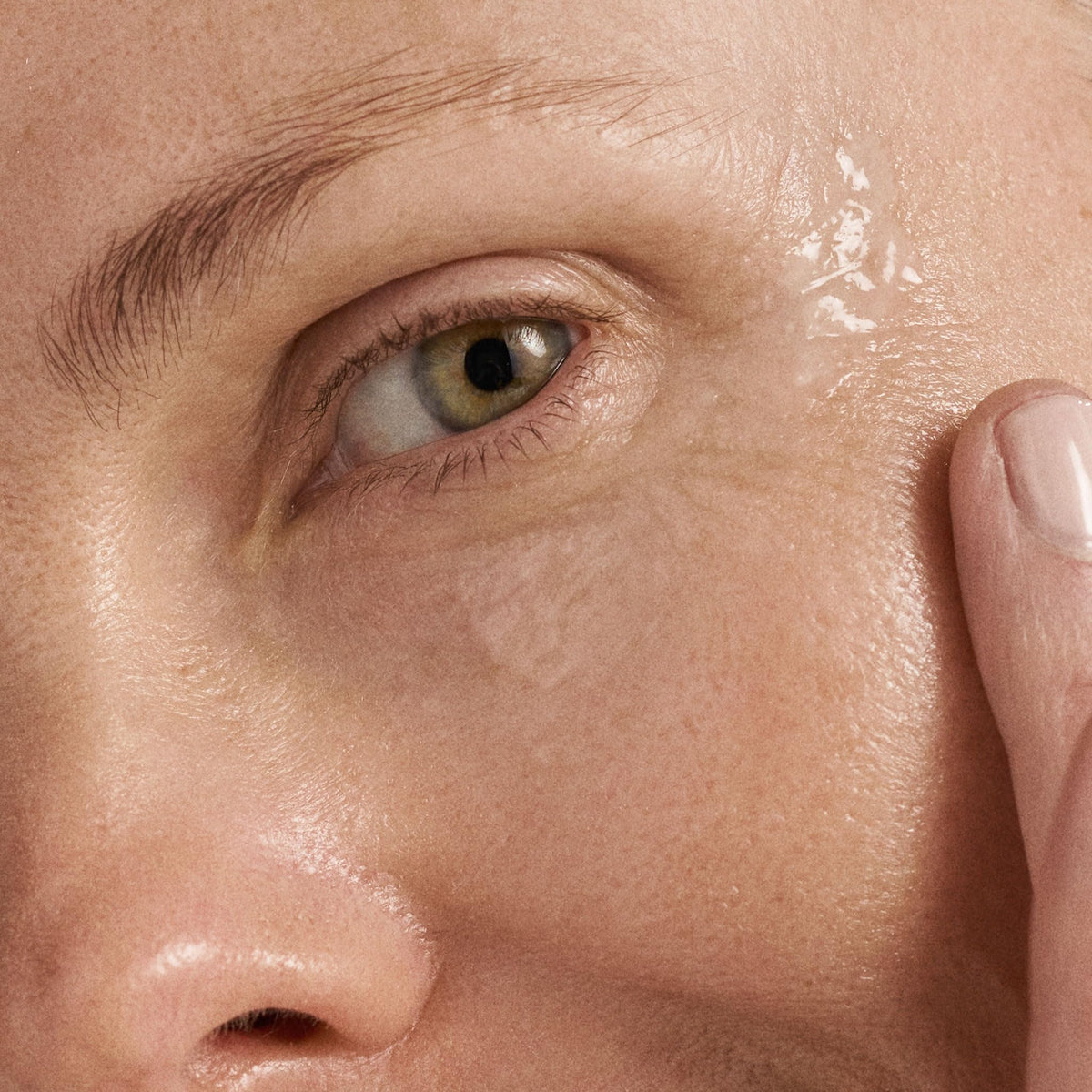 Dermalogica application demo gently patting cream around eye