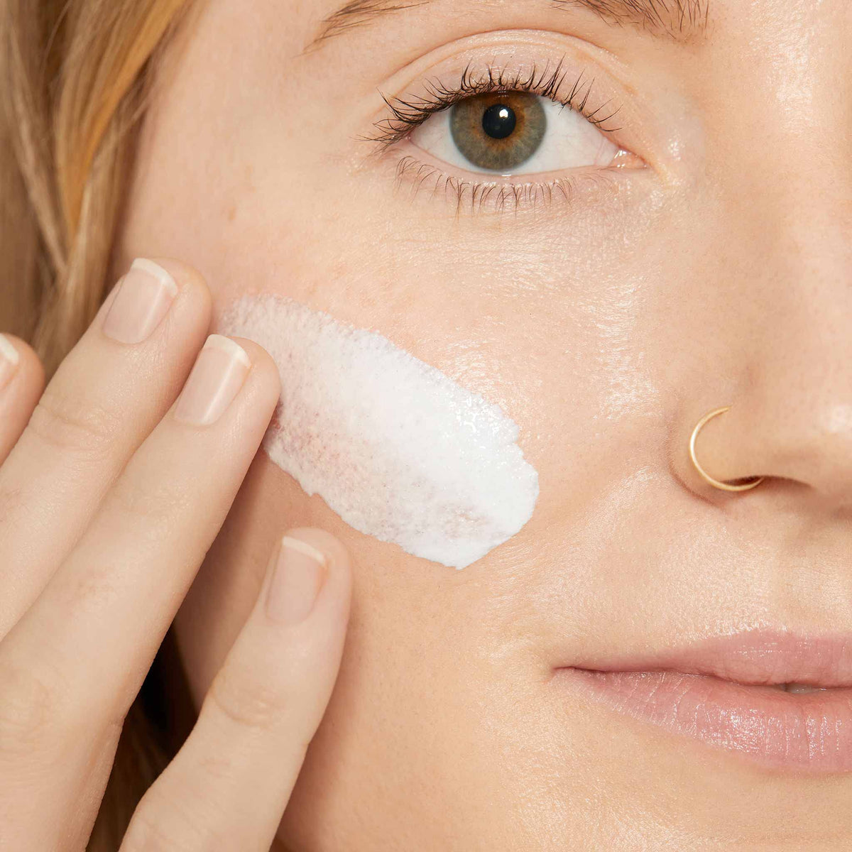 Dermalogica primer effect on cheek reducing visible pores for smoother appearance