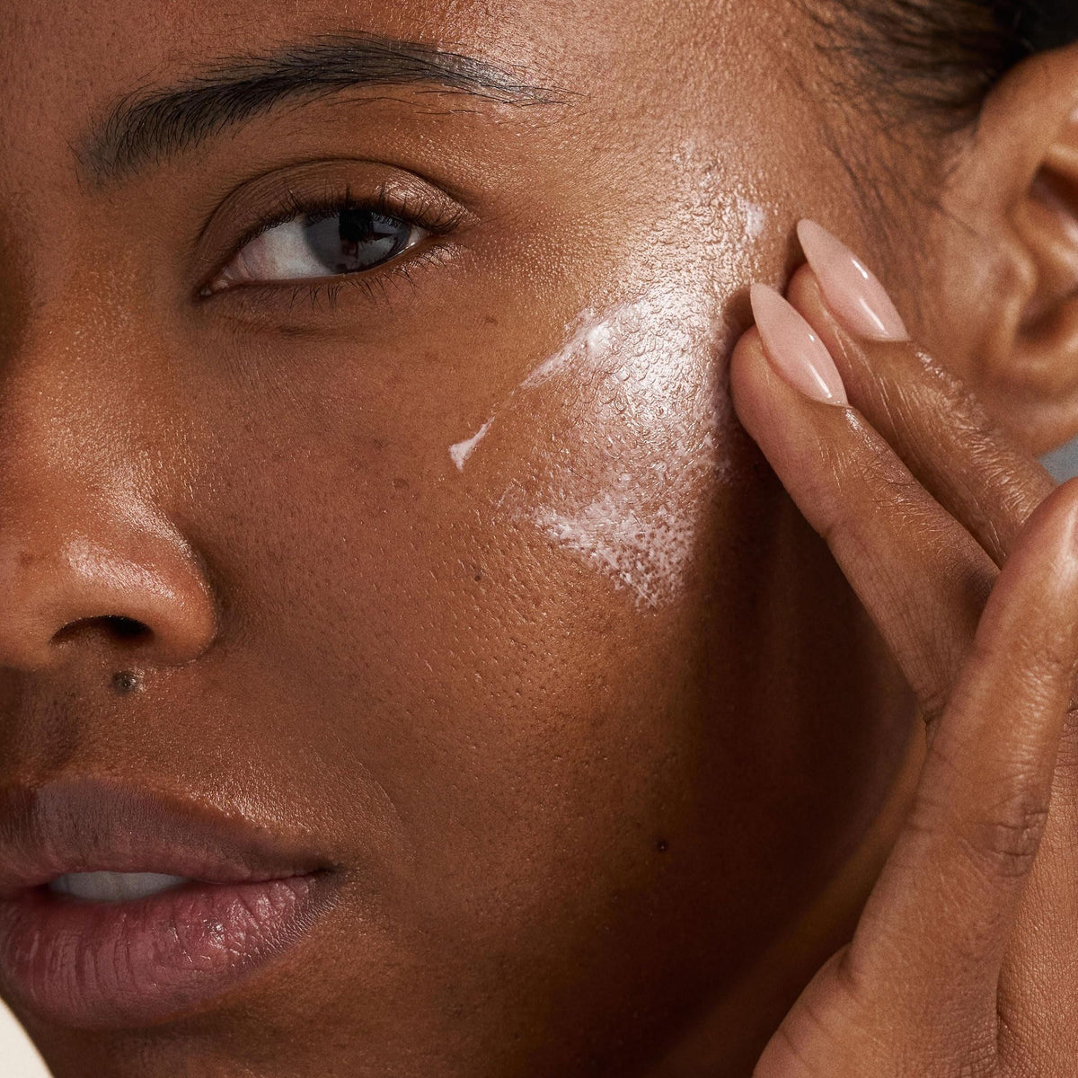 Dermalogica Prisma Protect cream on hand demonstrating spreadability and smoothing benefit