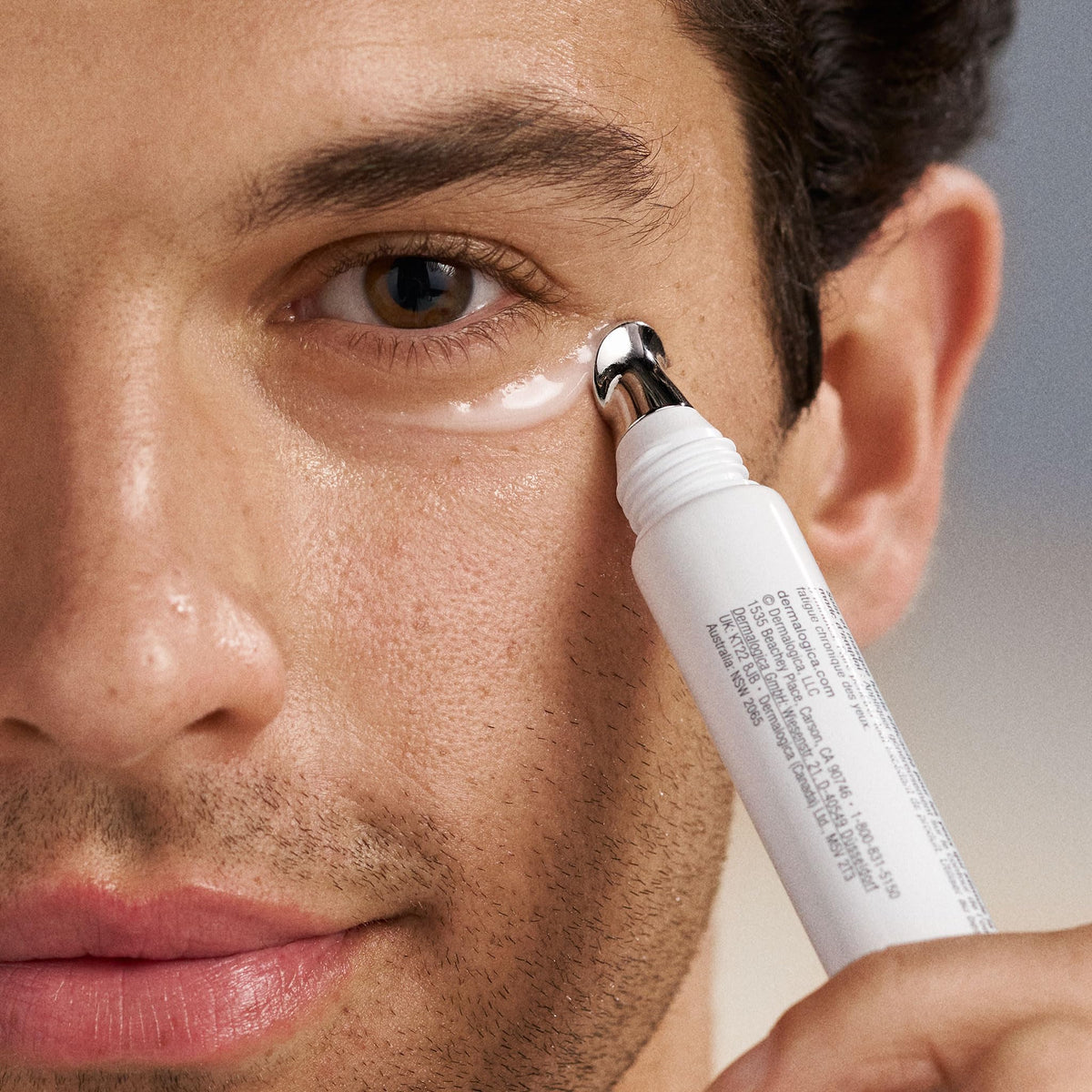 Dermalogica open tube with product on fingertip, demonstrating lightweight consistency