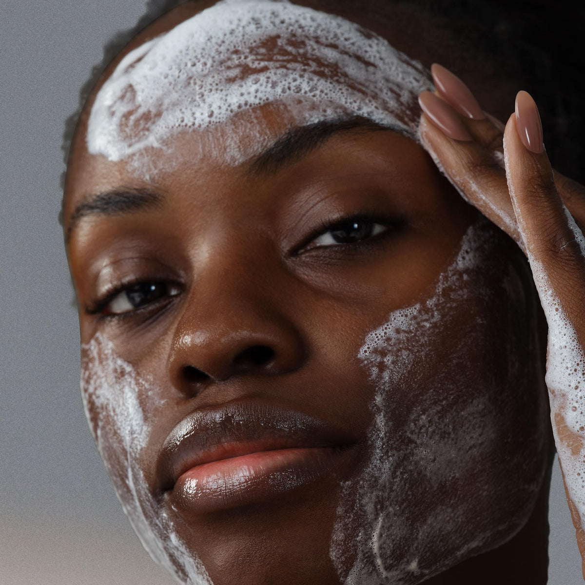 Dermalogica foamy cleansing texture demonstrating oil-removing, non-stripping action