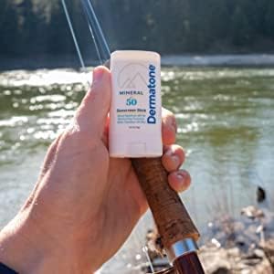 DERMATONE stick used at beach demonstrating water-resistant benefit