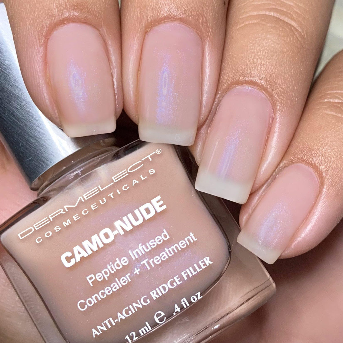 Dermelect nail in use application showing easy brushing and instant smoothing benefit