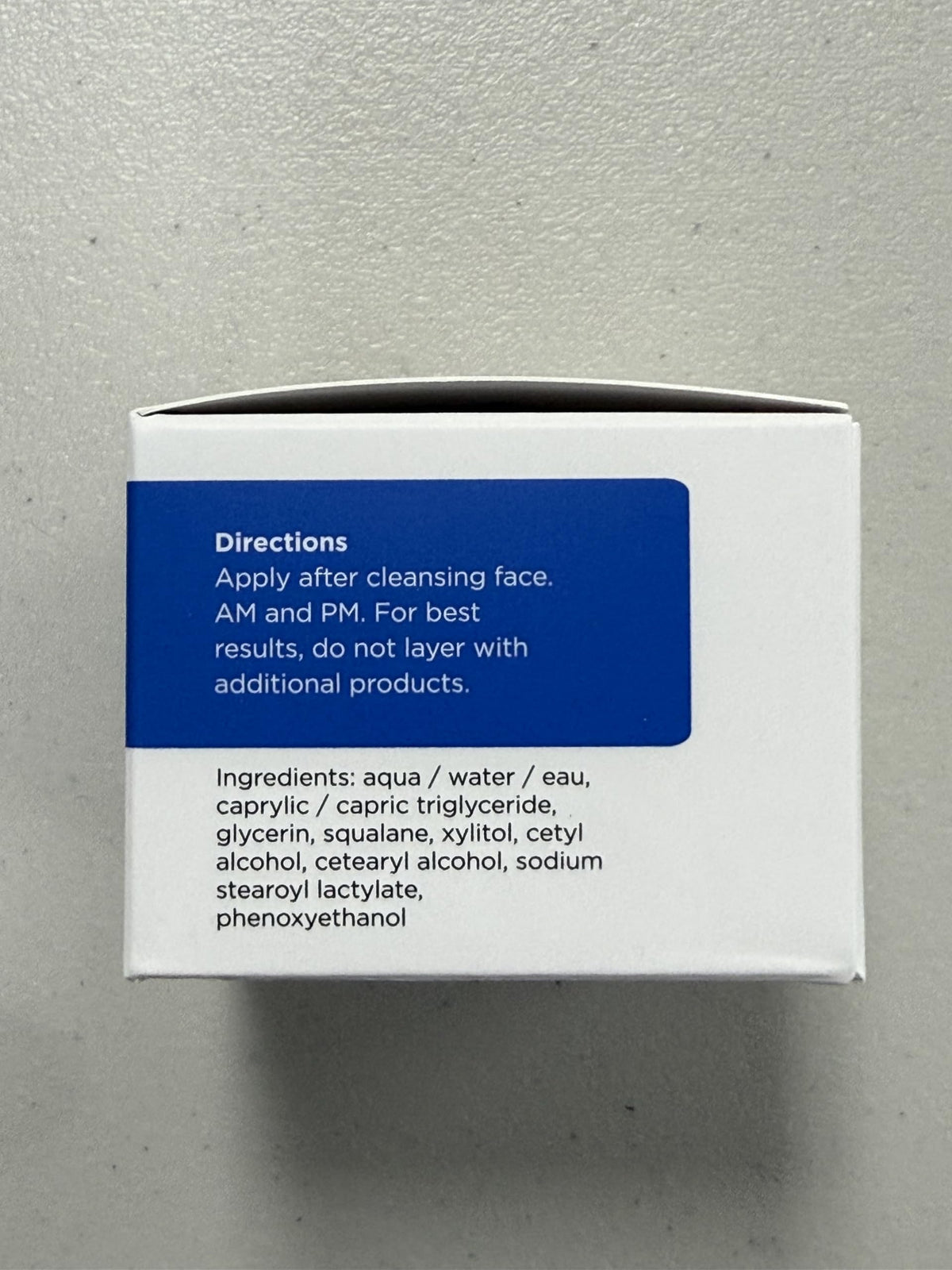 Dermgentle lifestyle bathroom shelf showing calm routine and stored kit