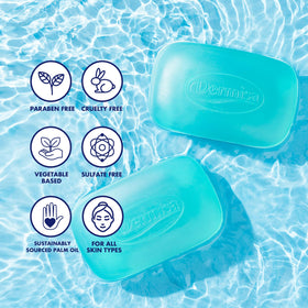 Three Dermisa glycerin bars in hand for size comparison and travel-friendly convenience