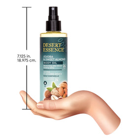 Desert Essence top view with a drop showing nourishing oil consistency