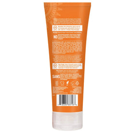 Desert Essence in-use image of wet hair application demonstrating easy distribution and hydrating effect
