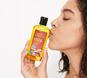 Using Desert Essence jojoba oil to gently remove makeup and impurities