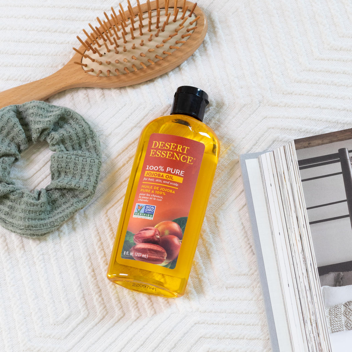 close-up of Desert Essence jojoba oil texture on skin showing lightweight absorption and smooth finish