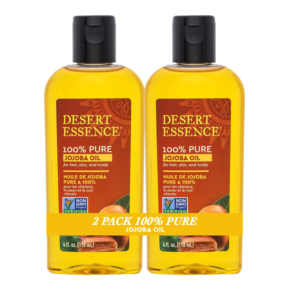 Desert Essence 100% Pure Jojoba Oil front bottle showing clear golden oil and label benefits