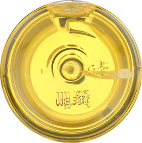 Desert Essence bottle on bathroom shelf conveying daily routine and glow