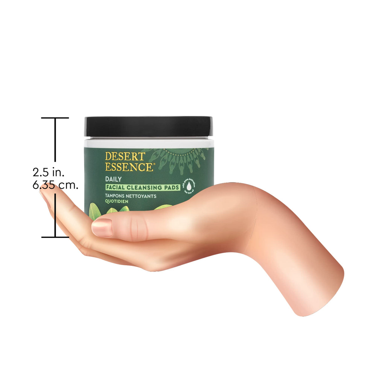 Desert Essence pad in hand demonstrating travel-friendly scale