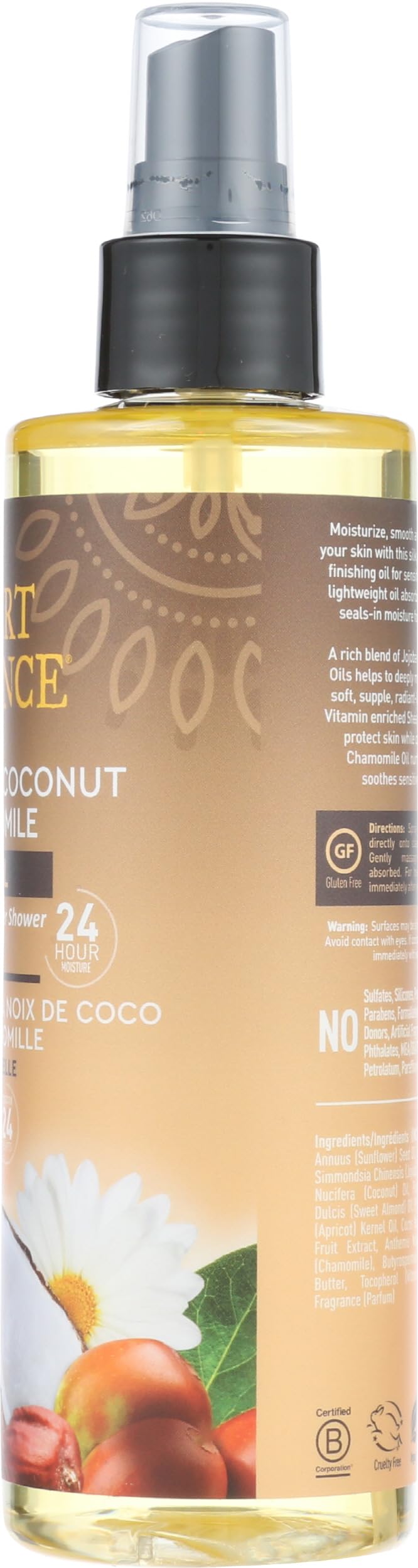Hand holding Desert Essence bottle to show 8.28 fl oz size and portability