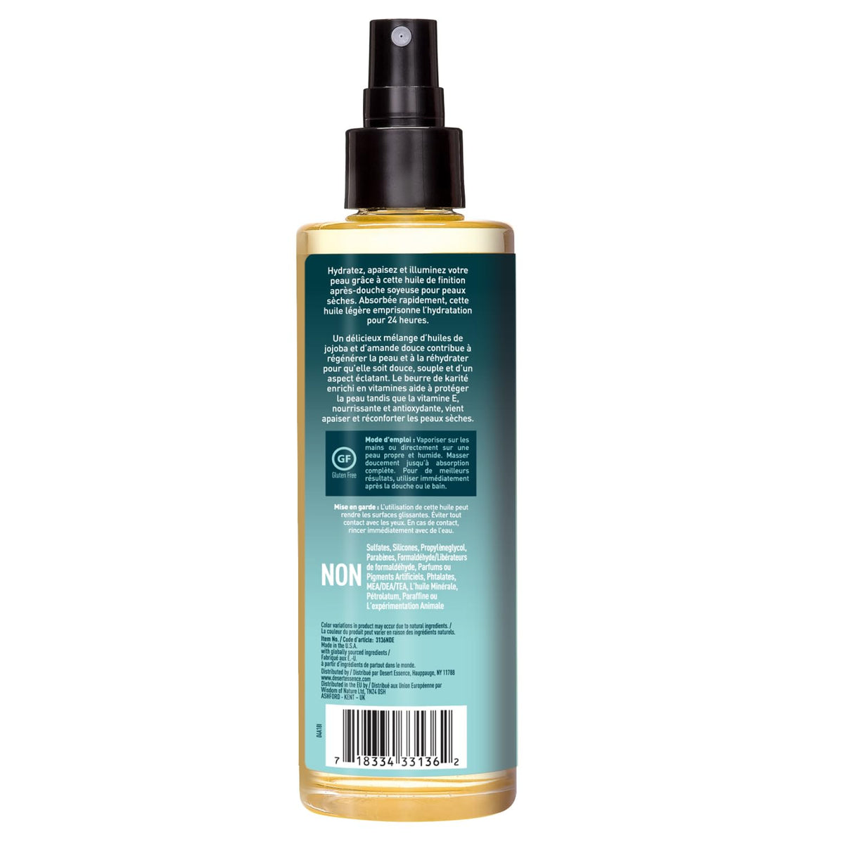 Desert Essence bottle in hand to show 8.28 fl oz size and portability