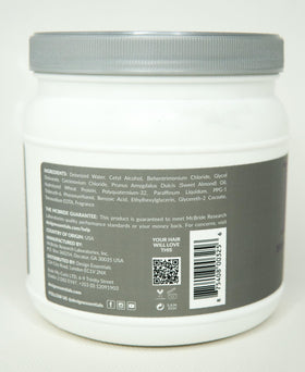 Design Essentials almond butter applied to hair for instant detangling and smoother combing