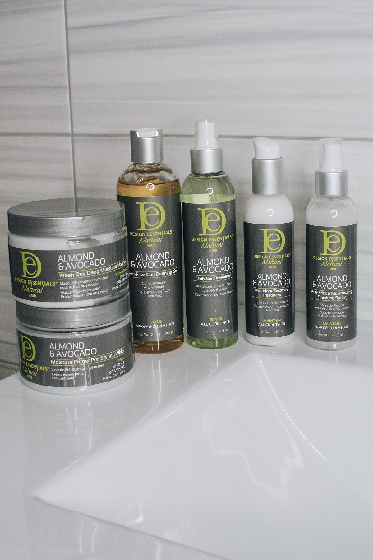 Design Essentials product applied to hair demonstrating overnight repair