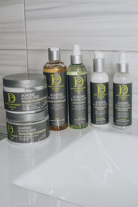 Design Essentials product applied to hair demonstrating overnight repair