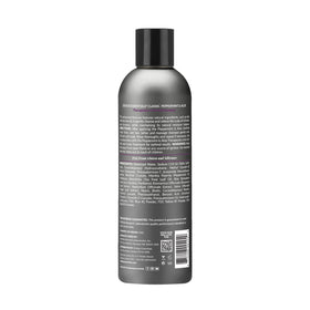 Design Essentials shampoo texture close-up showing creamy consistency and smooth lather