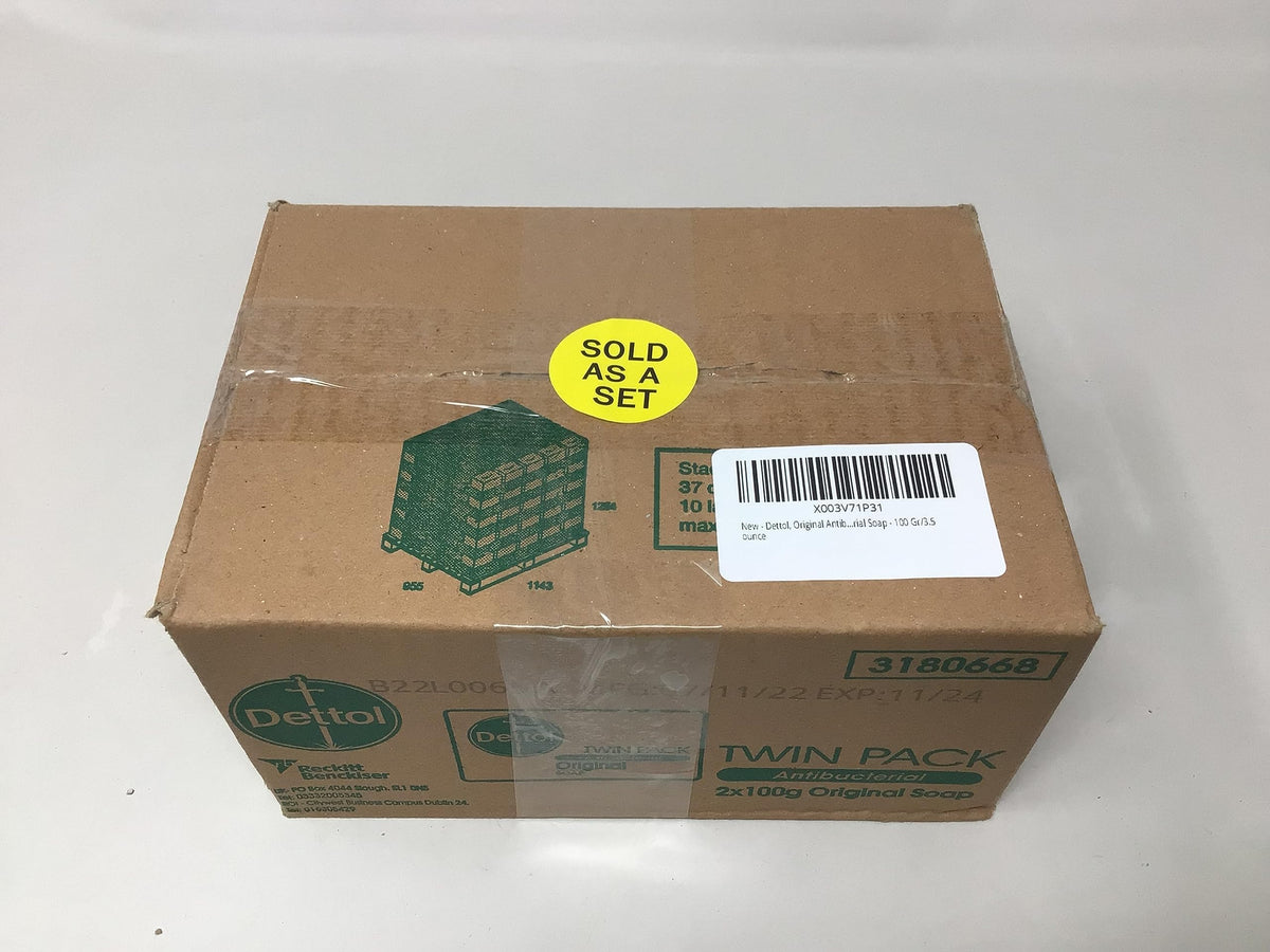 Pile of Dettol bars from pack illustrating bulk supply convenience