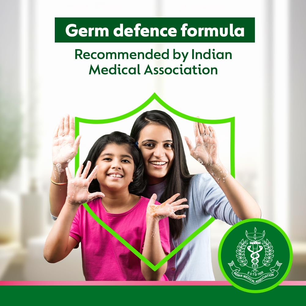 Dettol bottle next to a hand to show 875ml size and refill convenience