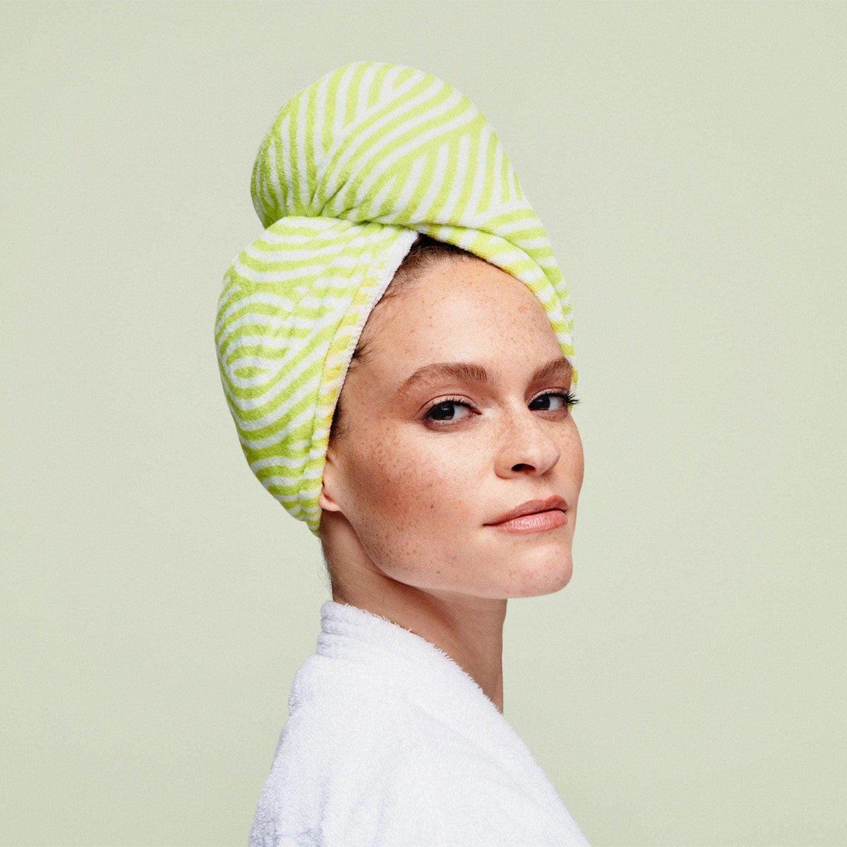 DevaCurl size comparison on model illustrating roomy fit for varied curl lengths