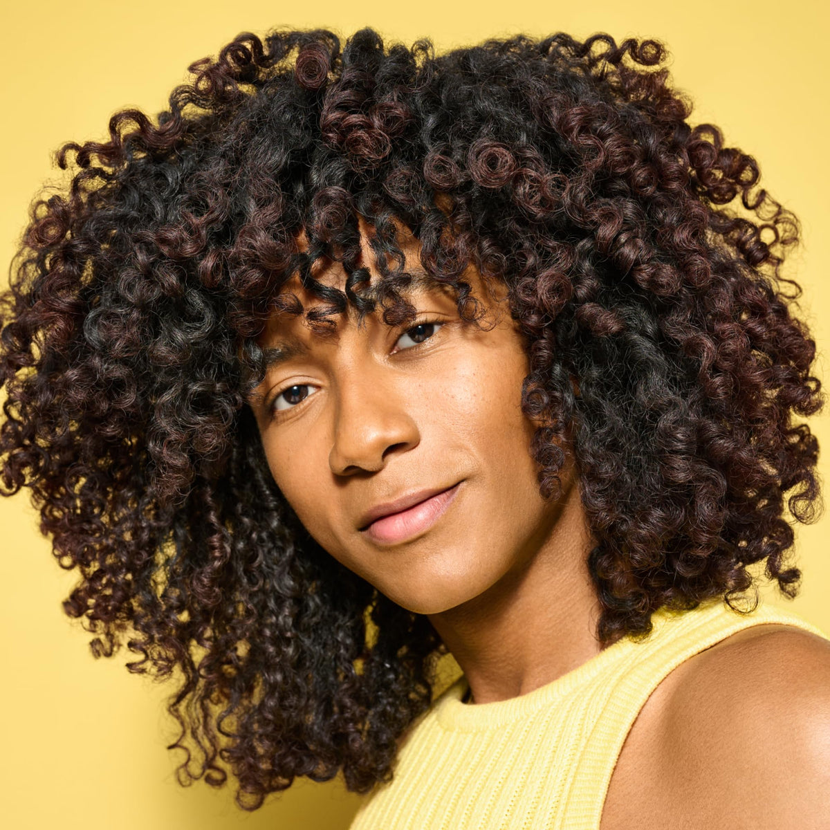 DevaCurl cream texture close-up displaying rich moisture and easy application slip