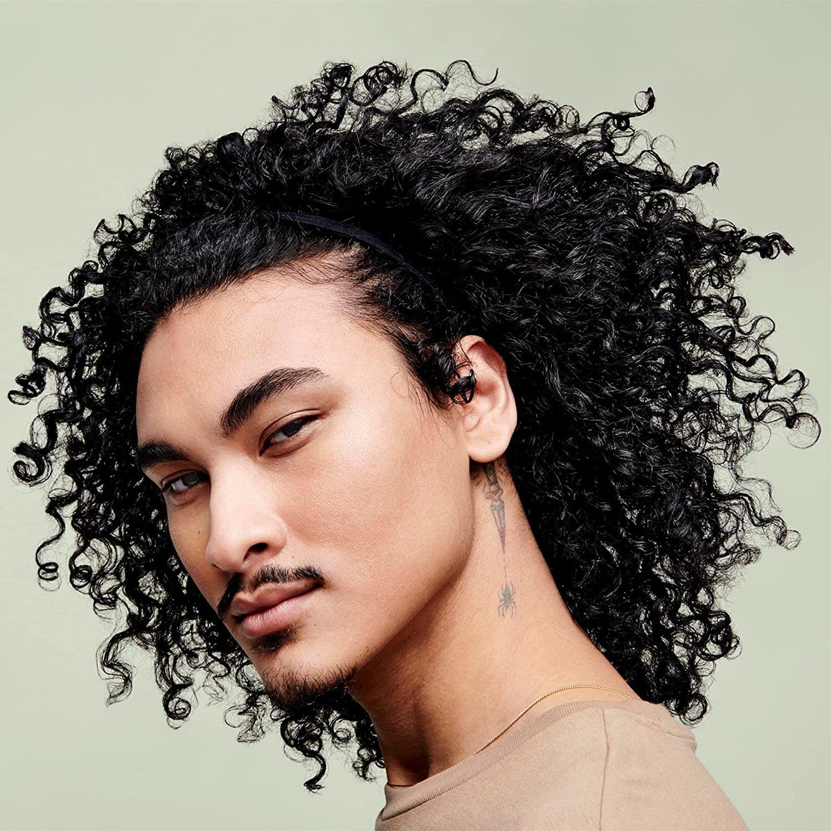 DevaCurl applied on damp curls showing easier detangling and definition
