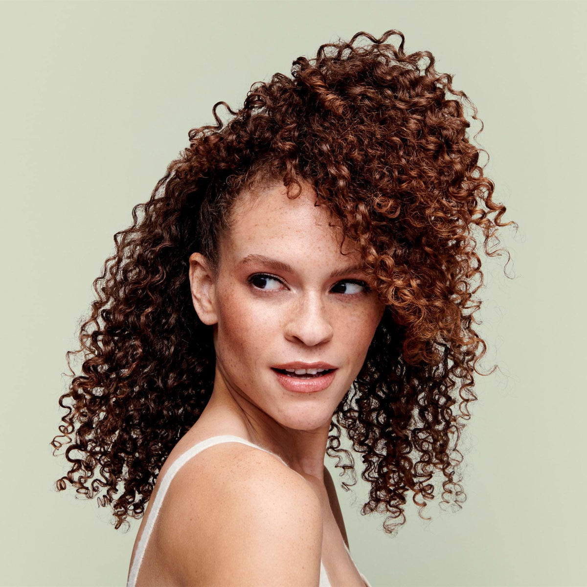 DevaCurl creamy low-lather texture demonstrating gentle cleanse