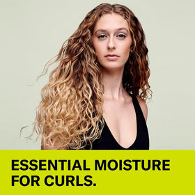 DevaCurl cream texture shot showing rich, non-lather formula for moisture