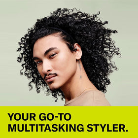 DevaCurl SuperCream applied in hand demonstrating slip for easier detangling