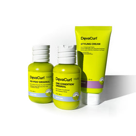 DevaCurl travel kit inside toiletry bag for on-the-go curl care benefit