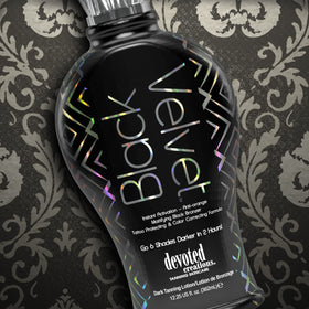 Devoted Creations bottle beside measuring tape showing 12.25 oz size and professional capacity benefit