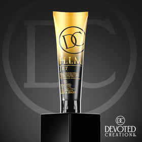 Devoted Creations HIM Jet creamy lotion texture illustrating smooth spreadability