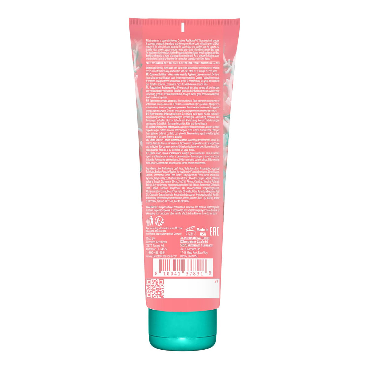 Devoted Creations lotion texture on fingertips demonstrating smooth, moisturizing feel
