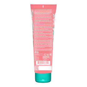 Devoted Creations lotion texture on fingertips demonstrating smooth, moisturizing feel