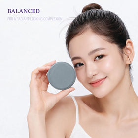 Dewvia charcoal and niacinamide closeup showing clarifying and evening benefits