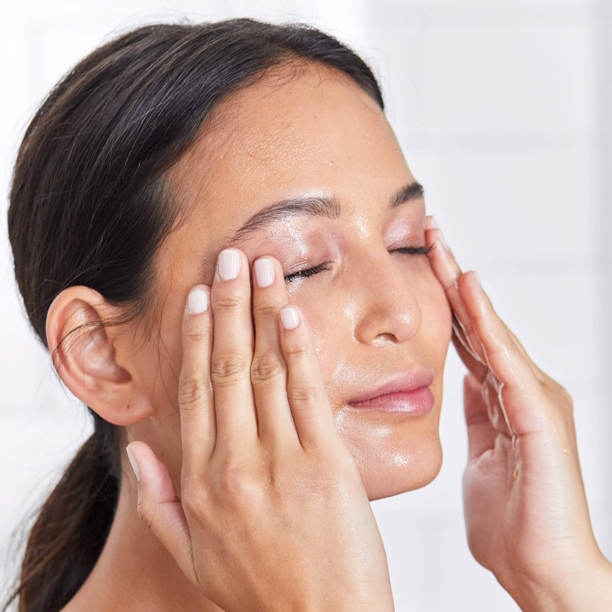 DHC removing waterproof mascara showing effective makeup dissolution