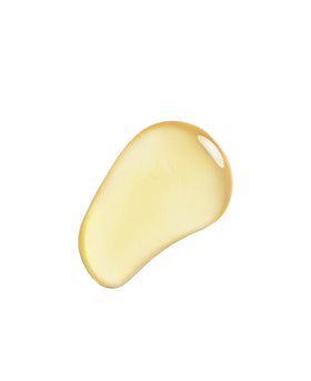 DHC oil texture on palm illustrating lightweight, nourishing glide