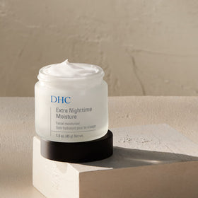 DHC 1.5 oz jar next to ruler showing compact size and travel portability