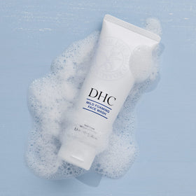 DHC open cap and product texture showing creamy consistency for soft skin