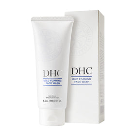 DHC foam dispensed on palm demonstrating creamy lather for gentle cleansing