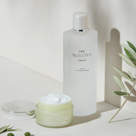 DHC bottle next to measuring scale indicating 6 fl. oz. size benefit