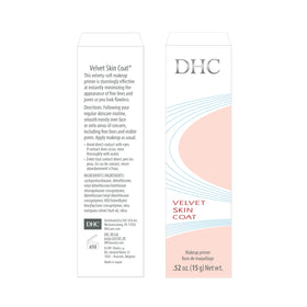 DHC Velvet Skin Coat jar beside a coin showing compact 0.52 oz size for travel convenience