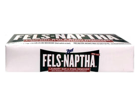 Dial Purex Fels-Naptha bar next to folded clothes showing compact size benefit