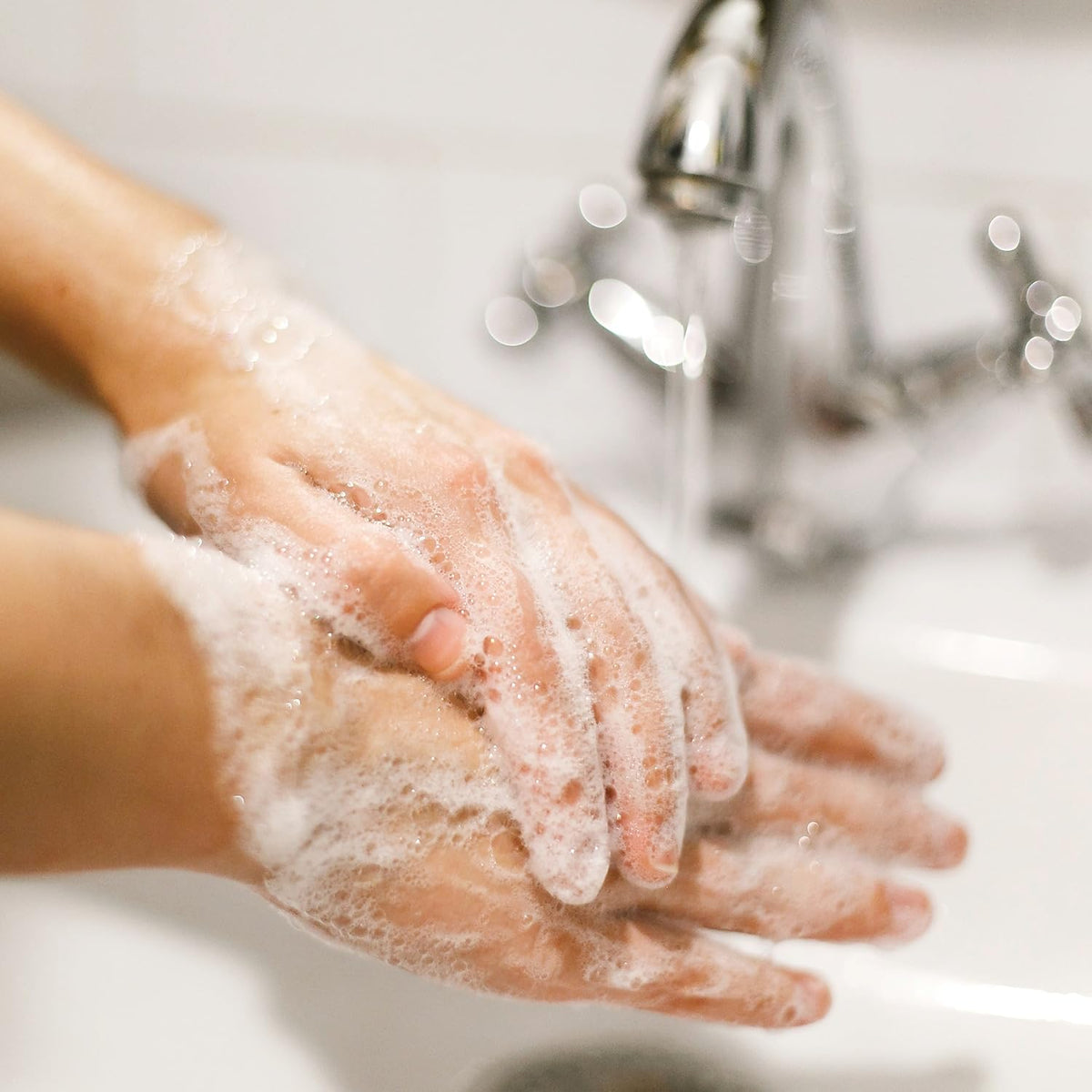Close-up of Dial soap lather texture showing gentle conditioning and effective rinse
