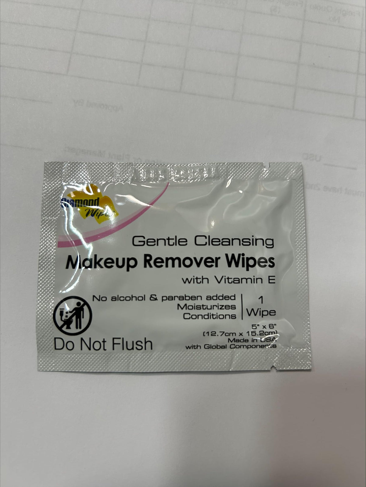 Diamond Wipes packet on a nightstand illustrating bedside makeup removal routine