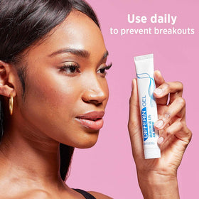Differin in bathroom regimen setting showing integration into daily skincare routine