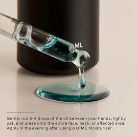 DIME blue facial oil ingredient flatlay with key botanicals illustrating natural blend